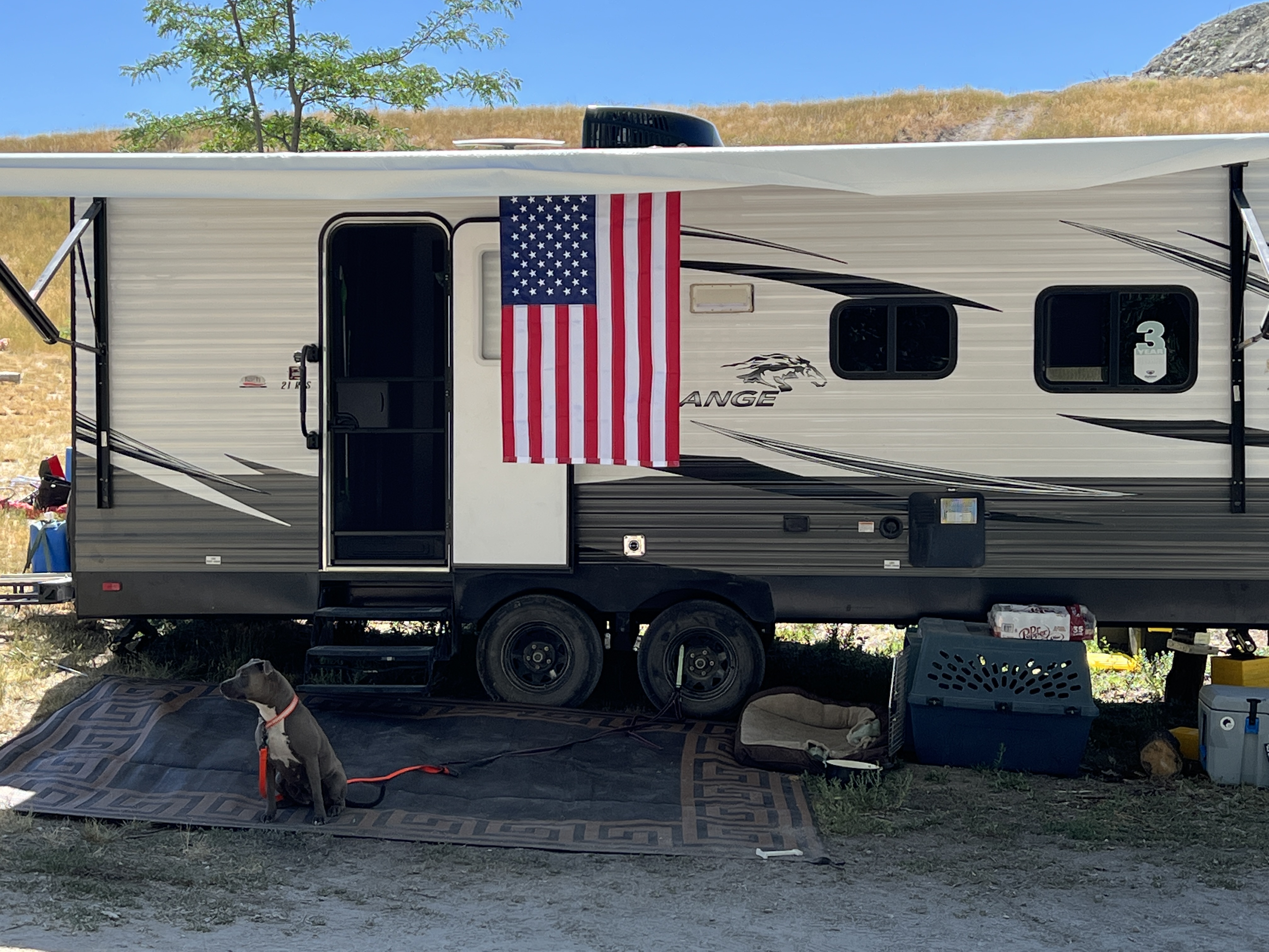 RVFlag installed on travel trailer awning